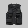 Mesh vest with three-dimensional pockets (detachable at the back)